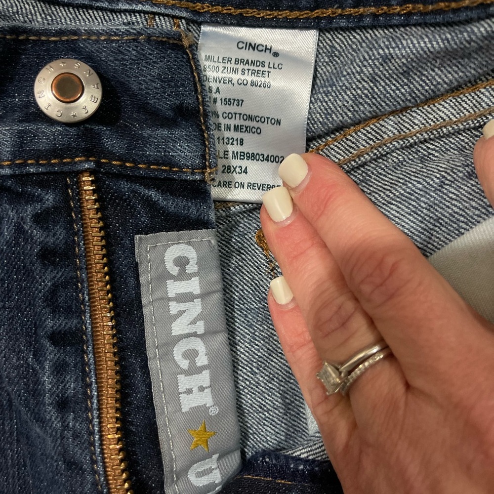 2 pairs of men’s jeans.
Cinch and ariat